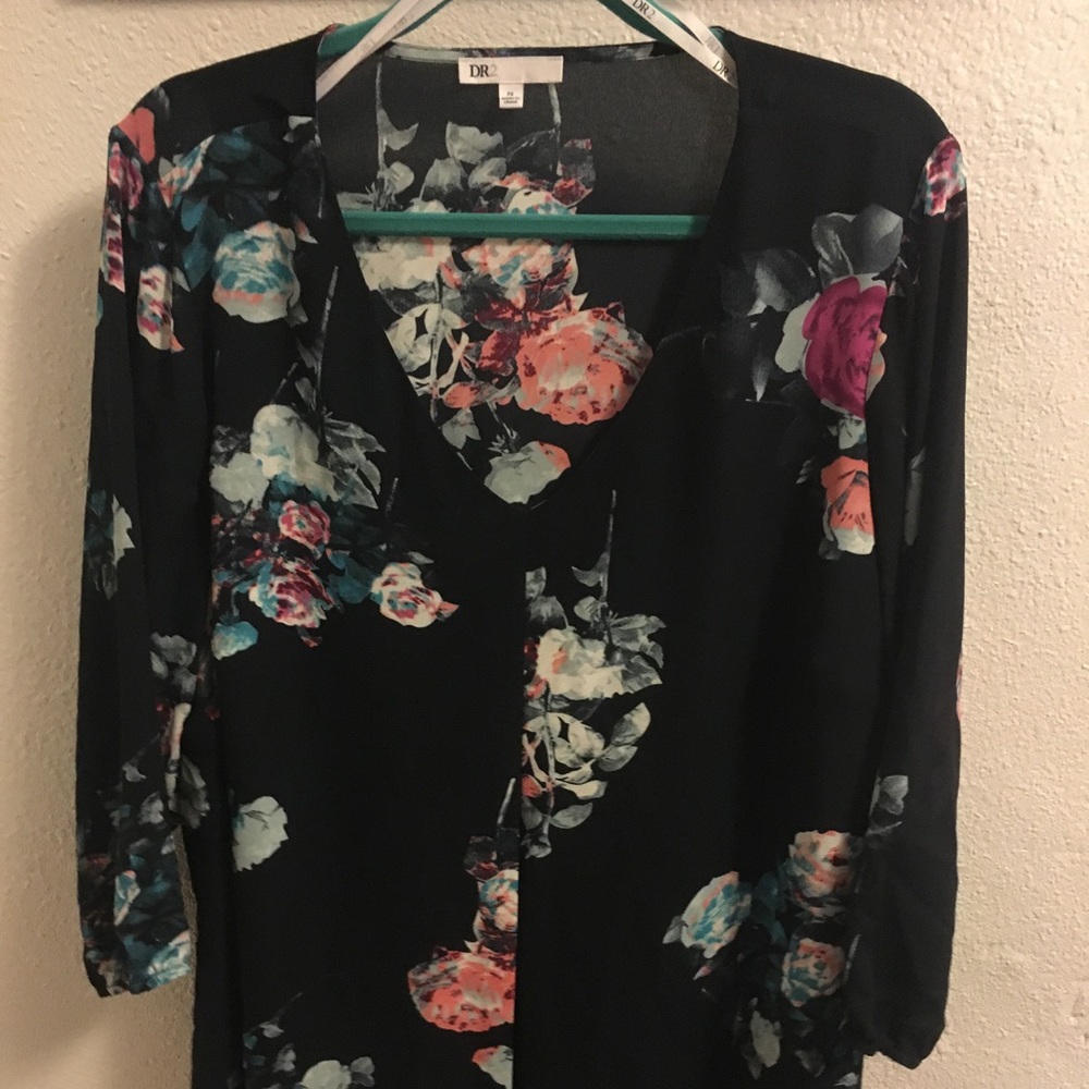 Navy blue floral blouse.