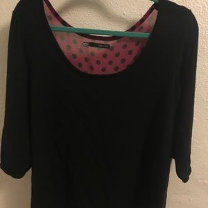 Sweater in the front, see through in the back