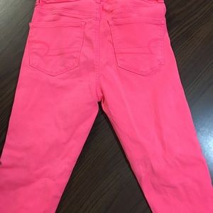 hot pink american eagle jeans