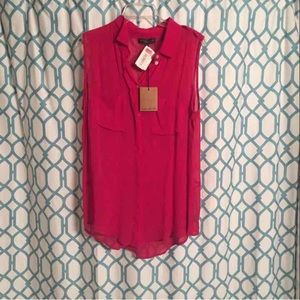 Pink sleeveless button down blouse