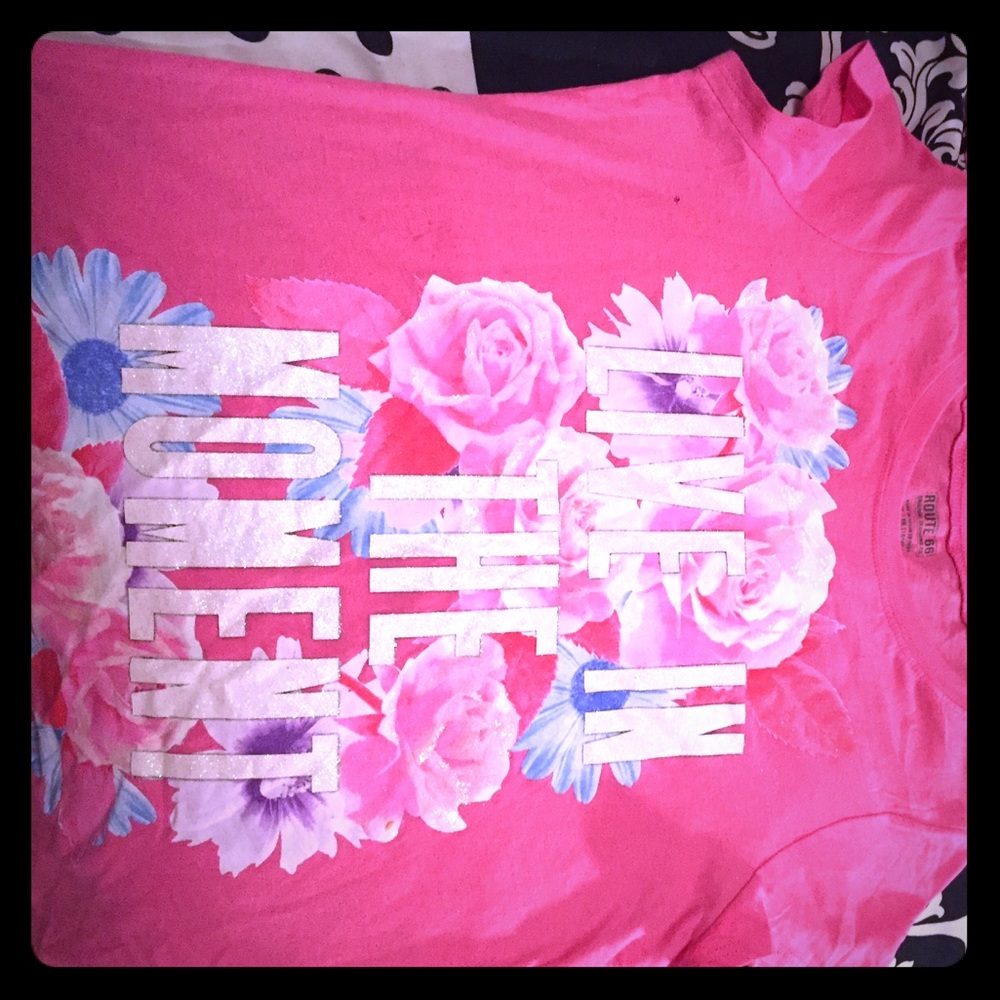 Shirt that says live in the moment with flowers