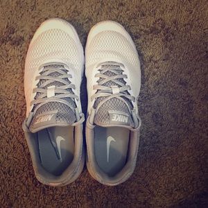 White and Grey Nike Flex Experience shoes