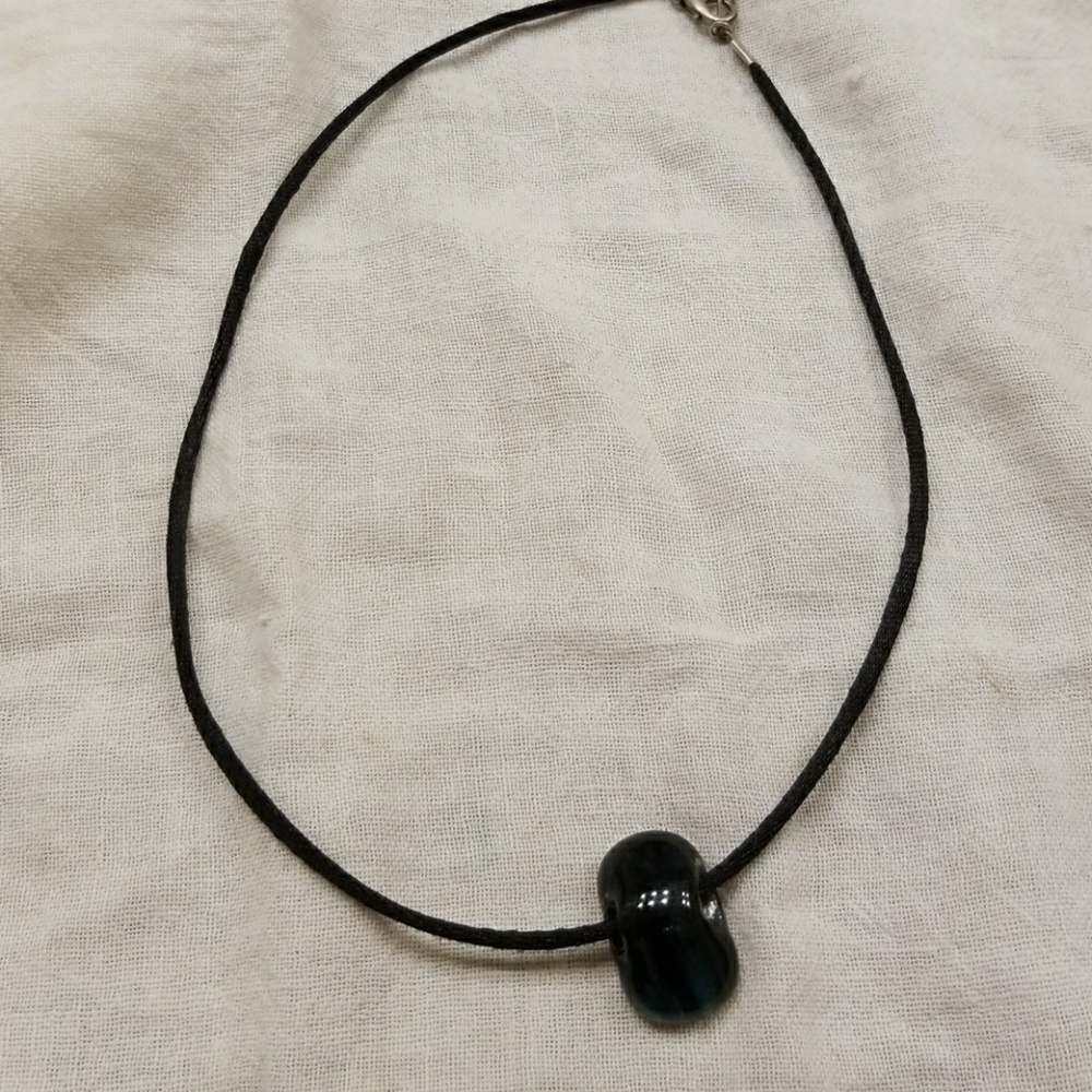 Balancing stone necklace.
