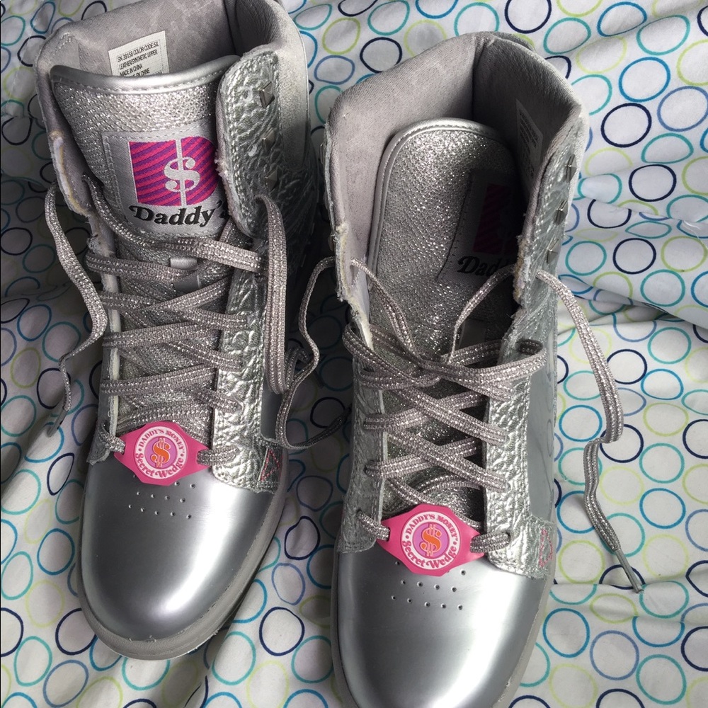 Silver wedge sneakers.