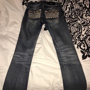 Size 25 mid rise slim Miss Me Boot cut jeans
