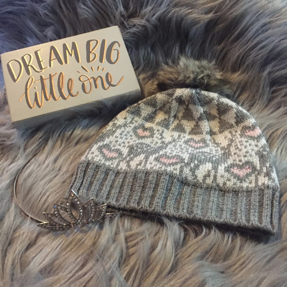 Infant beanie with fur ball topper