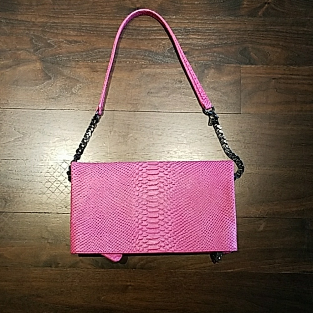 Convertible snake leather  show stopper bag