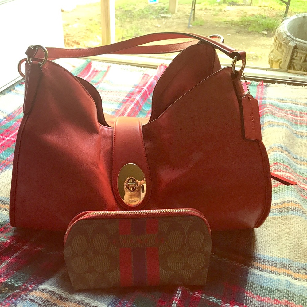 Medium Coach bag and cosmetic bag matches.