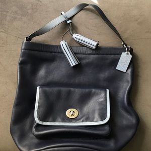 Navy blue coach bag. Some stains on inside