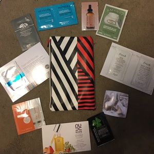 Lot of skincare samples with make-up bag