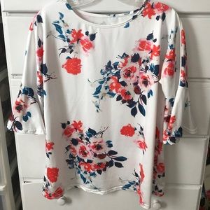 Brand new floral blouse with flared sleeves
