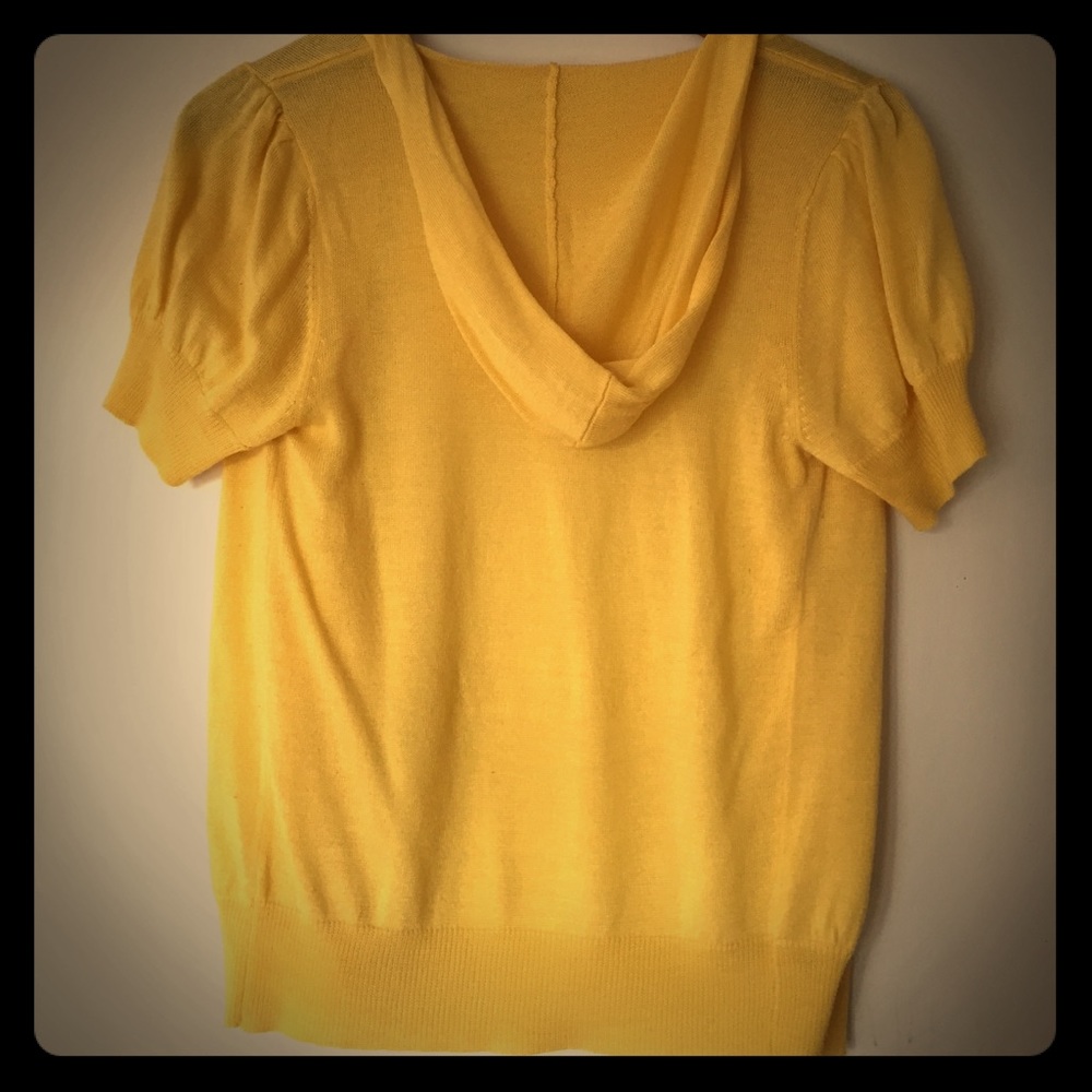 Yellow zip front hooded top