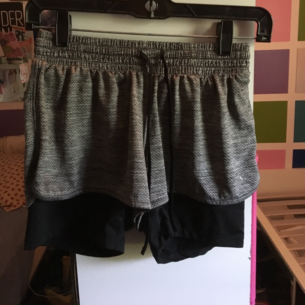 Gray shorts with black spandex attached