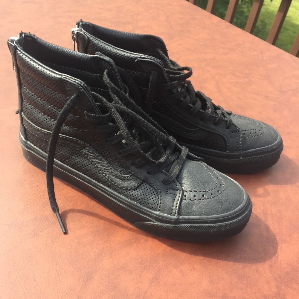 Black Hightop Vans with zippers