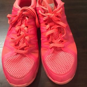 Hot pink Nike shoes