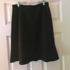Ruffled black skirt.