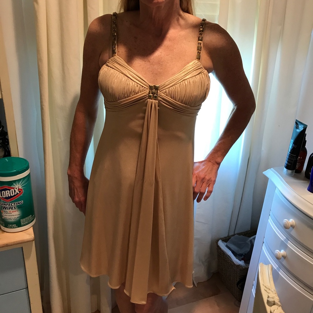 Gold sparkly dress with beaded designs