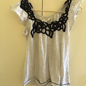 Flutter sleeveless top with felt trim