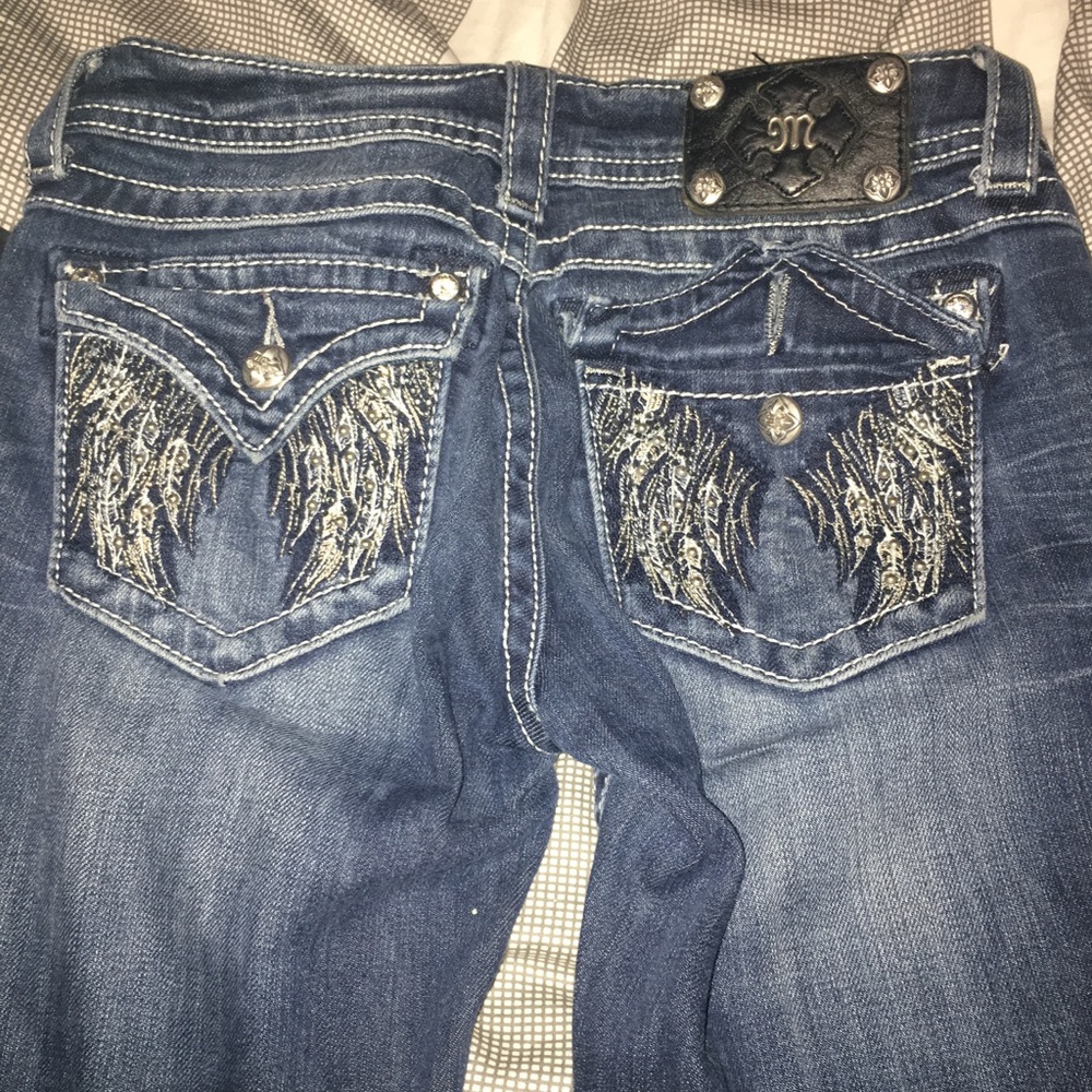 Dark, long miss me jeans! wings on the pocket