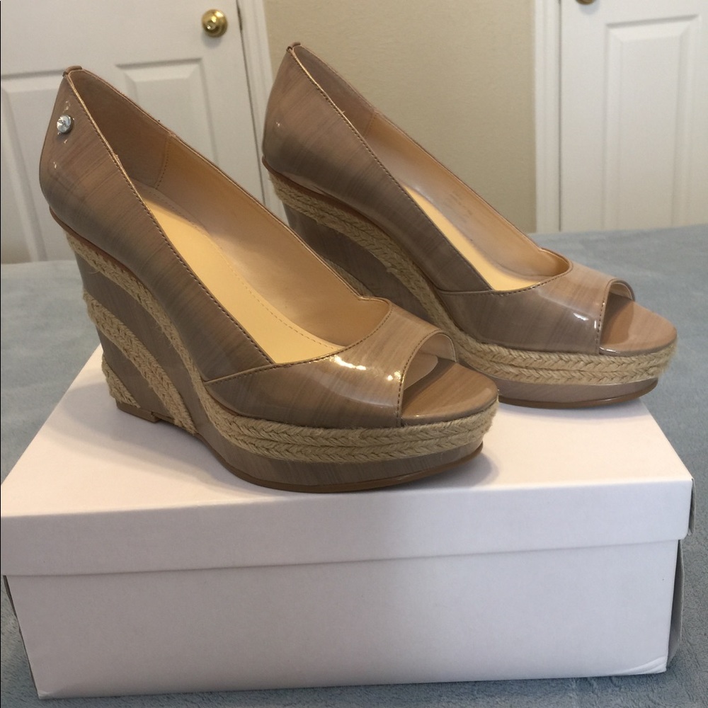 Calvin Klein wedge shoe.  Harlow Streak Patent.