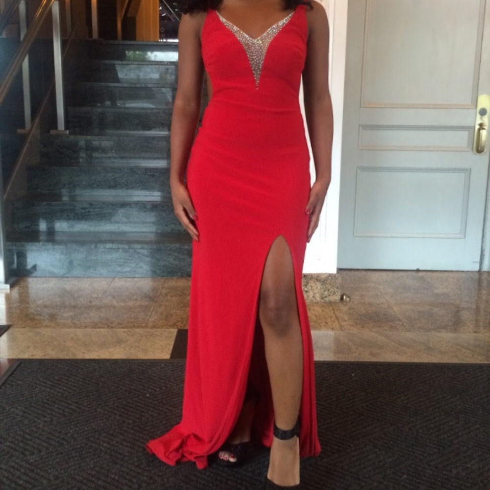 Red evening floor length gown with open back