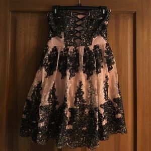 Sparkly blush and black homecoming dress
