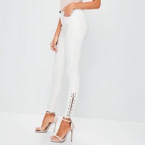 White Mid Rise Pierced Super Skinny Jeans