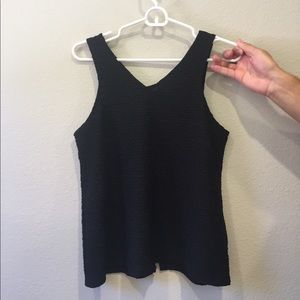 Black Anthropologie tank top.