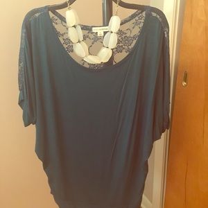 Turquoise, lace-back shirt
