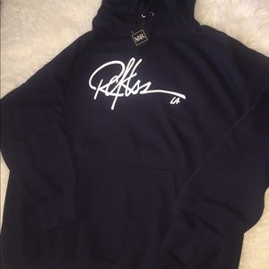 Mens Young & Reckless navy blue pullover sweater.