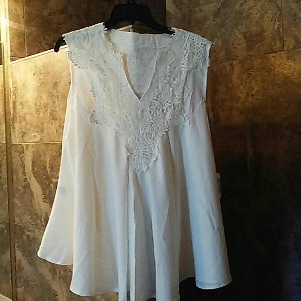 White sleeveless top