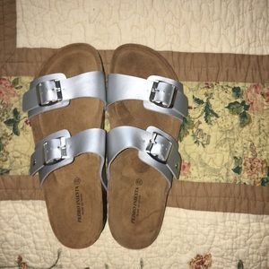 Silver like Birkenstock sandals.
