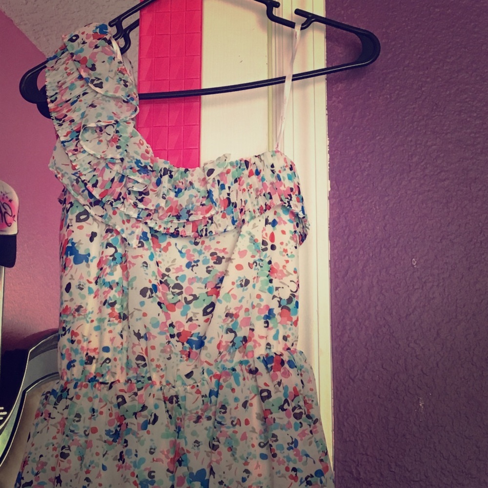 Colorful one shoulder dress.