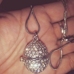 Swarovski egg pendant clock