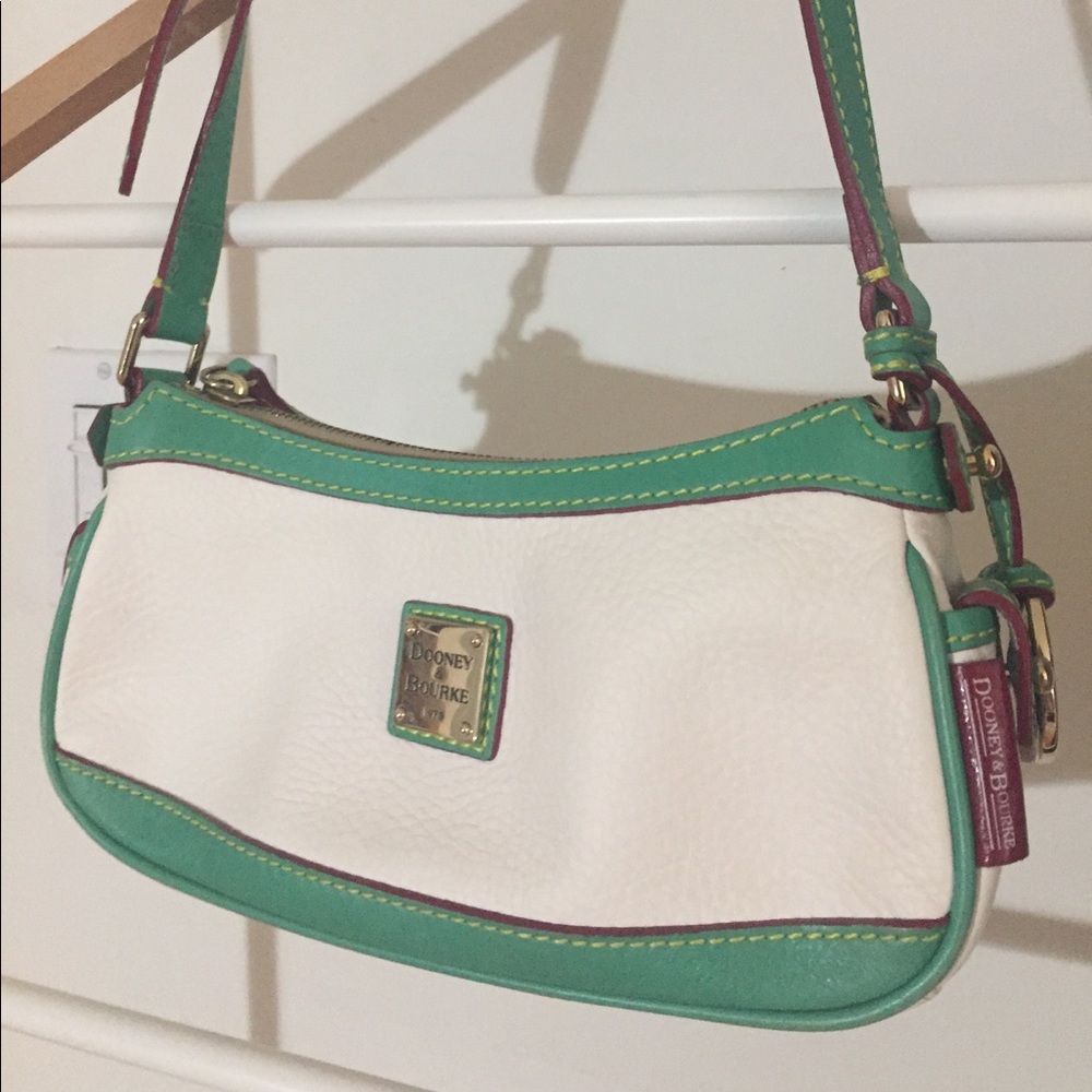 Small white and teal Dooney and Bourke purse