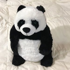 Plush panda bear. (Lotion for reference)