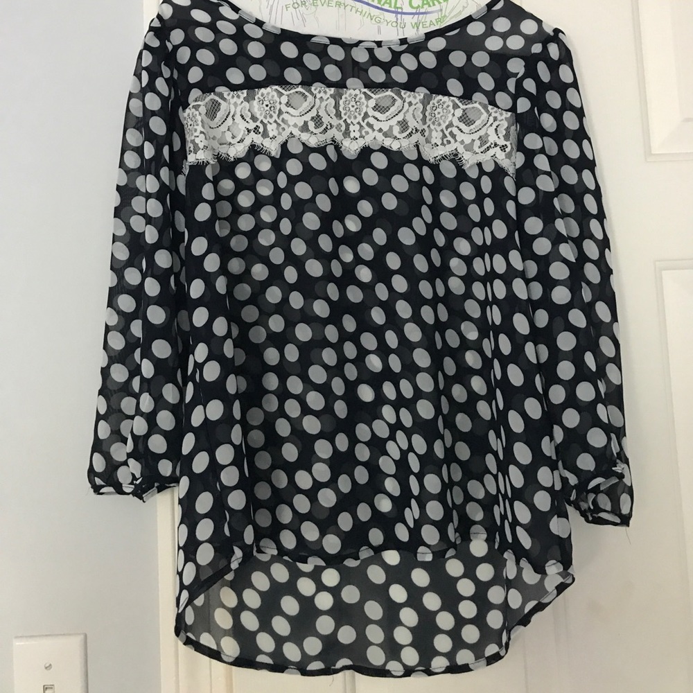 Navy blue blouse with white polkadots