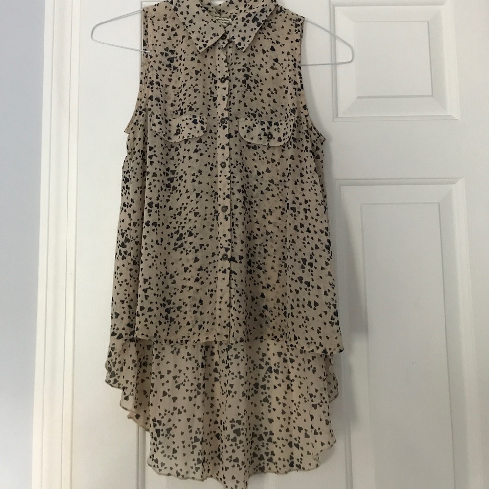 Tan, sleeveless blouse