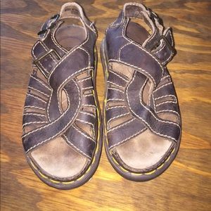 In GUC Dr Martin sandals.