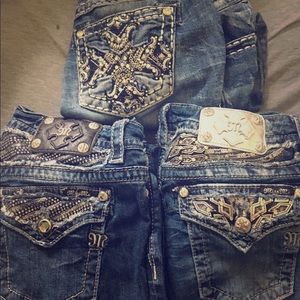 "Miss Me" signature cropped jeans.