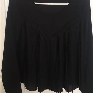 Sheer black top with ruffles