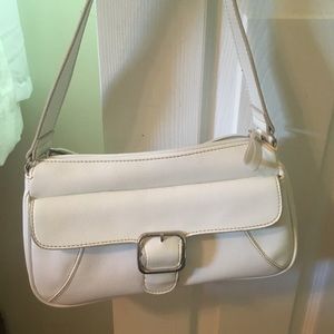White handbag with silver buckle