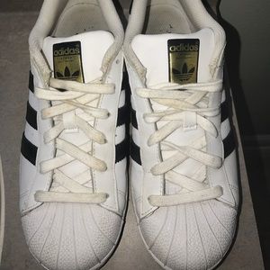 White-and-black Adidas Superstar
