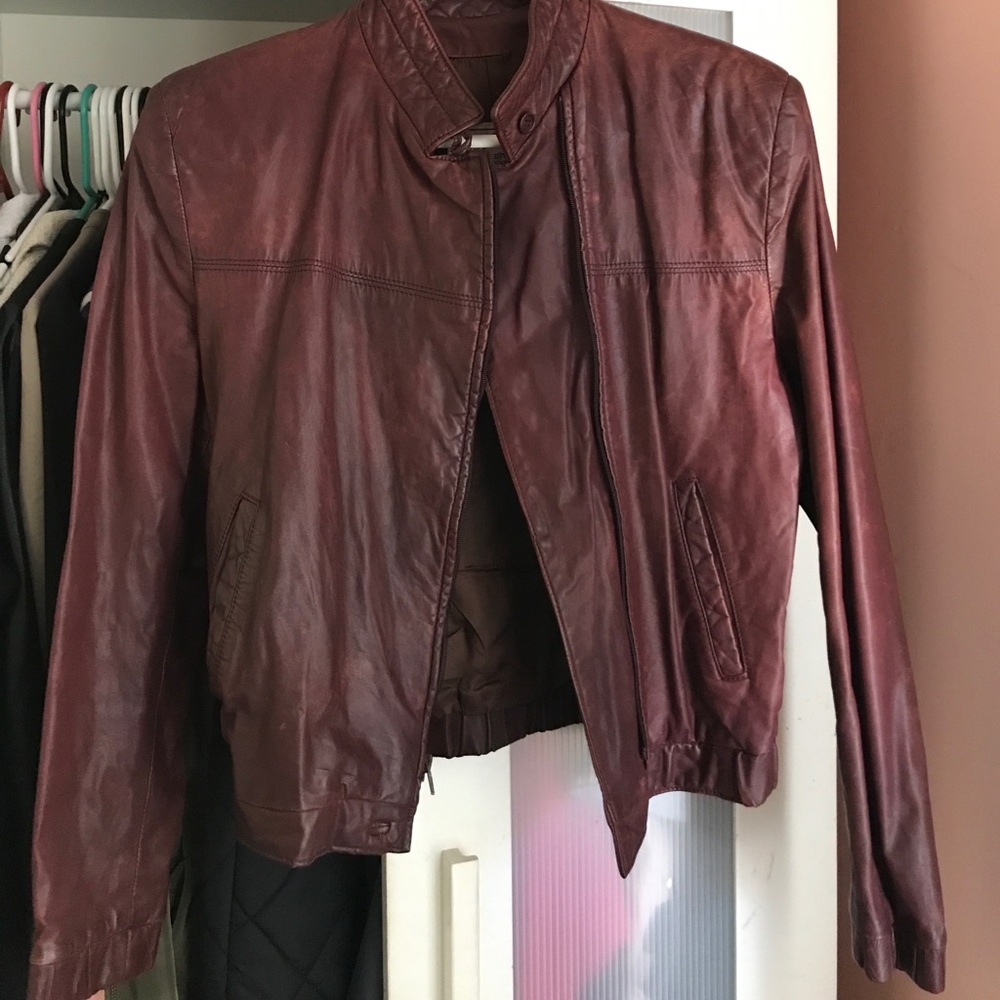 Distressed genuine leather moto jacket.