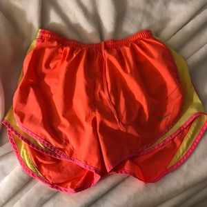 Orange Nike shorts