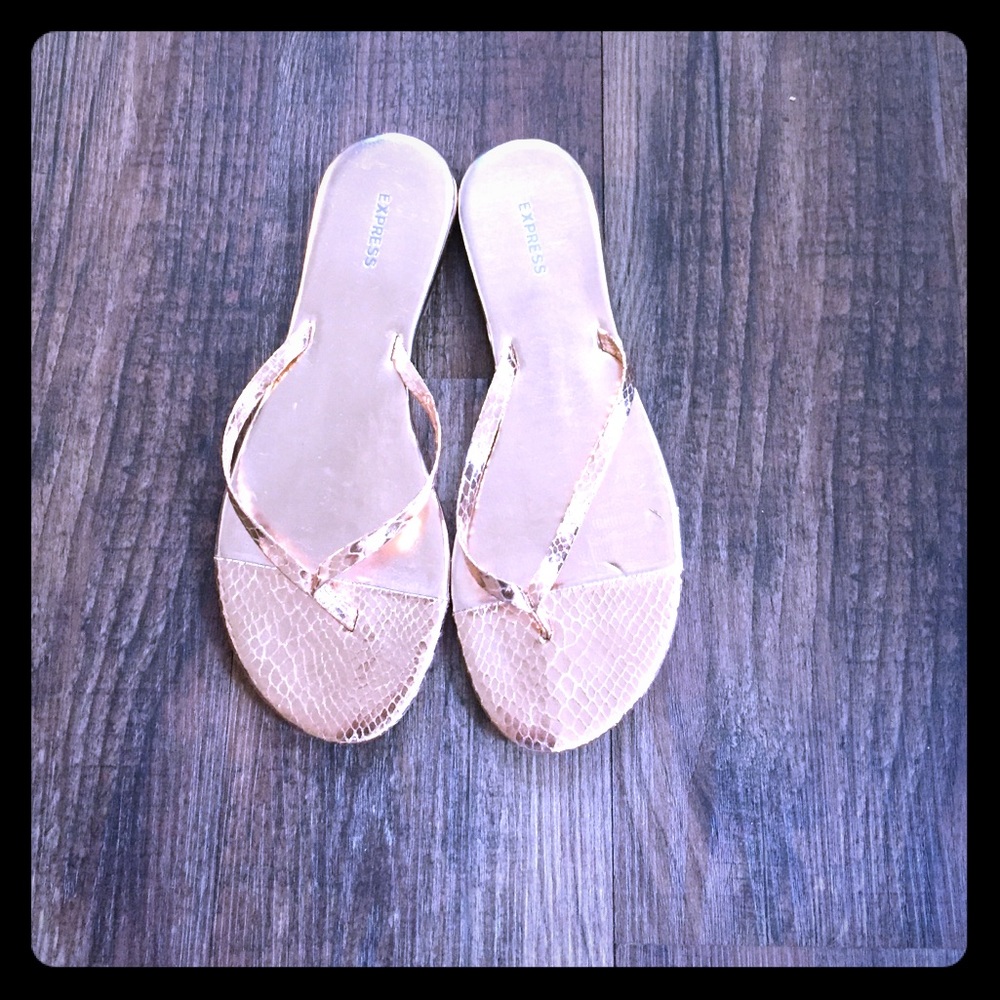 Rose gold flip flops