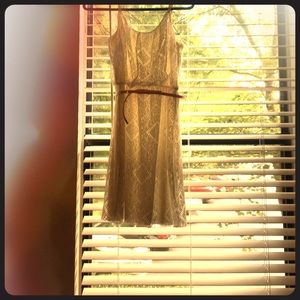 White dress, pink belt