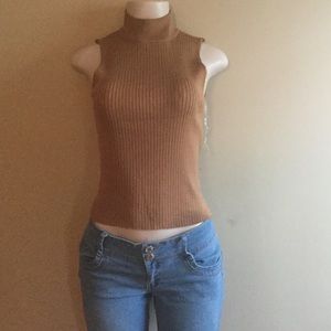 Tan sleeveless turtleneck