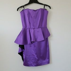 Never worn, adorable bebe peplum purple dress