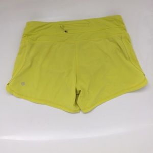 Neon yellow lululemon running shorts